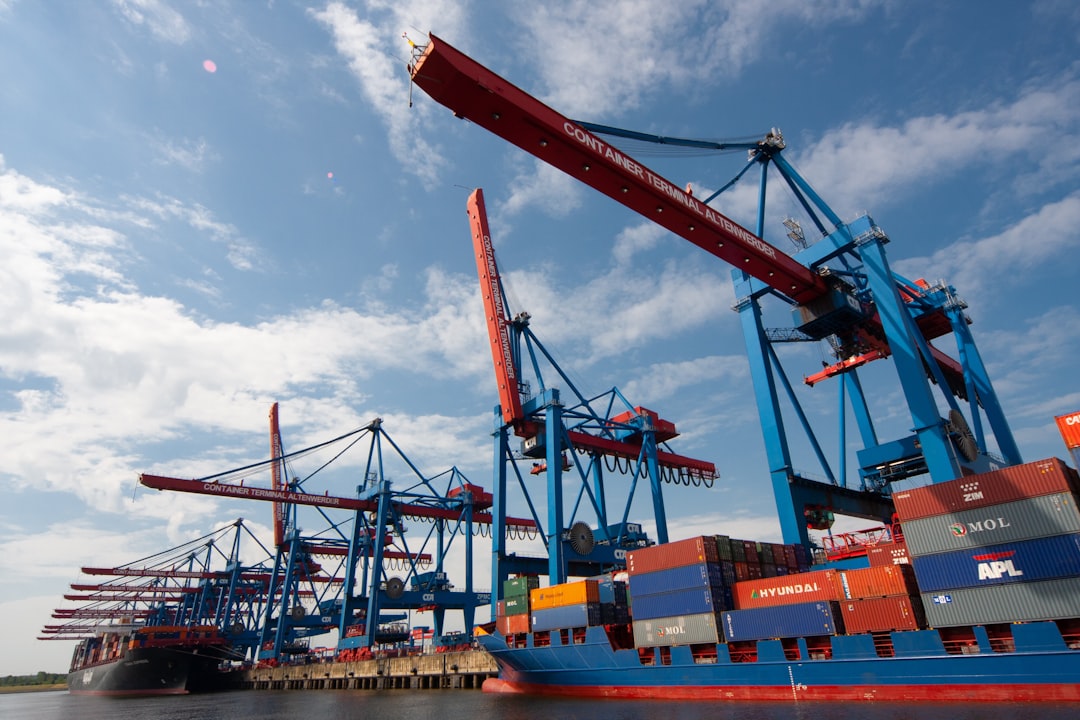red-and-blue-crane-under-blue-sky-during-daytime-mp6fmo8khn4